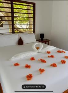 Ένα ή περισσότερα κρεβάτια σε δωμάτιο στο Dany Island