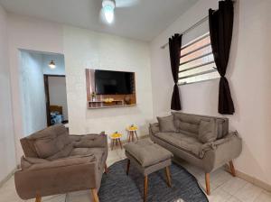 Телевизор и/или развлекательный центр в Sítio Paulinha e Rodrigão Classic bodybuilder