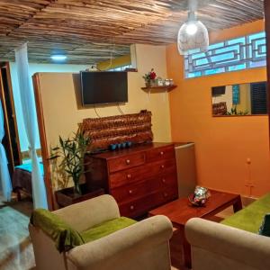 TV a/nebo společenská místnost v ubytování Amazon Home-Feliz Puerta