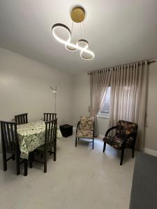 Et opholdsområde på Apartamento Centro Torres Jose Bonifacio + 8 billeder