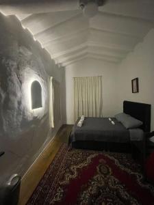 Giường trong phòng chung tại Casona Tres Reyes