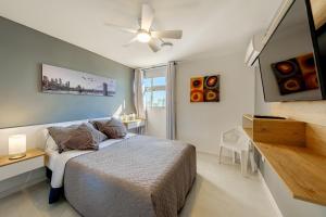 Ένα ή περισσότερα κρεβάτια σε δωμάτιο στο Alojamiento con Vista Y Salida al Mar