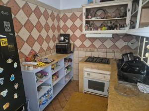 Η κουζίνα ή μικρή κουζίνα στο Lit dans dortoir proche plage