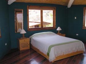 Krevet ili kreveti u jedinici u okviru objekta Vista del Mar Casa y Bungalows