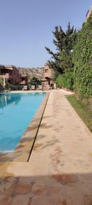 Piscina de la sau aproape de Les hauts de Taghazout