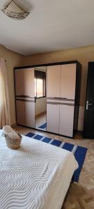 Un pat sau paturi într-o cameră la Les hauts de Taghazout +6 fotografii