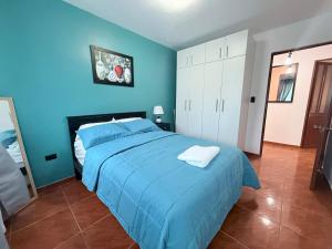 Ένα ή περισσότερα κρεβάτια σε δωμάτιο στο Departamento familiar