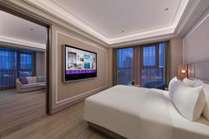 Μια τηλεόραση ή/και κέντρο ψυχαγωγίας στο Mercure Nantong Railway Station