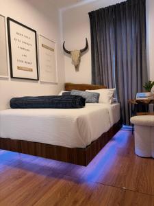 Ένα ή περισσότερα κρεβάτια σε δωμάτιο στο A Dedicated Space To Unwind