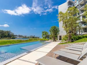 Πισίνα στο ή κοντά στο Cassia Exclusive Lake View Condo Bang Tao Beach