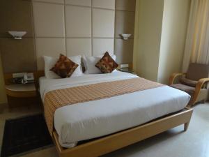 Postel nebo postele na pokoji v ubytování Ascot Hotel + 25 fotografií