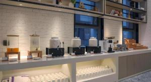a store with a counter with white appliances on it at Echarm Hotel Wuhan Gaotie Jianshe 2nd Road Metro Exit in Wuhan