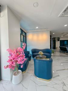 Χώρος καθιστικού στο The Answer Hotel