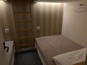 Giường trong phòng chung tại SHIMAGO SURFRIDER - Vacation STAY 85442v