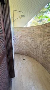 a walk in shower in a brick wall at Villa Sun 2 in Amphoe Koh Samui +12 photos