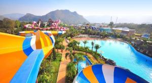 an aerial view of a water park with a roller coaster at OYO 75317 Pintara Fahsai Resort in Ban Khan Takhian