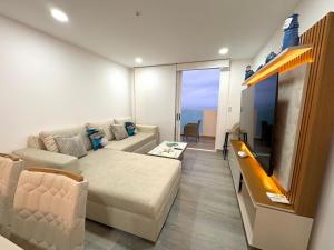 Et tv og/eller underholdning på Sunset City Piso 17 Relájate frente al mar