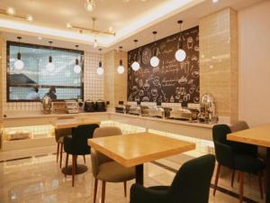 Χώρος καθιστικού στο GreenTree Inn Nanjing Baijiahu