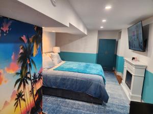 a bedroom with a bed and a tv in it at Old Salem House 15 mins from downtown Salem in Peabody