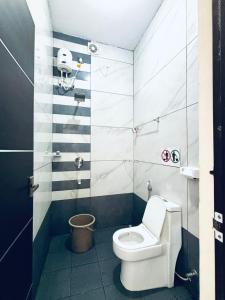 Koupelna v ubytování Kaattil Homes