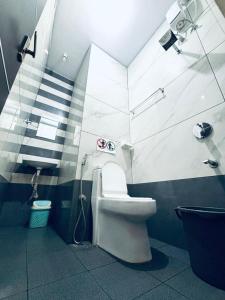 Koupelna v ubytování Kaattil Homes