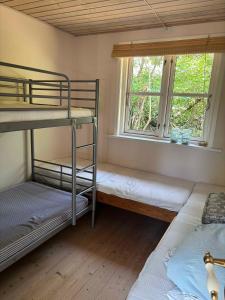 Una cama o camas en una habitación de In Beautiful Odsherred, Northwest Zealand