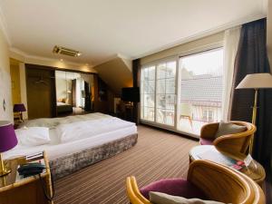Postel nebo postele na pokoji v ubytování Hotel "Schloss Friedestrom" + 28 fotografií
