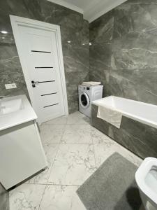 Koupelna v ubytování Apartament Confortabil + 7 fotografií