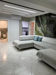 Posezení v ubytování Apartament Confortabil