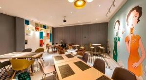 Χώρος καθιστικού στο Magnotel Fuzhou Wuyi Road Sanfangqixiang