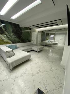 Posezení v ubytování Apartament Confortabil