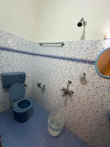 Koupelna v ubytování Amrutham Homestay + 40 fotografií