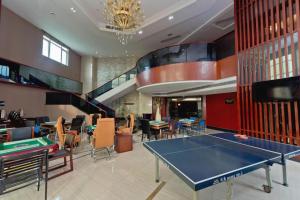 Stolní tenis v ubytování Dongguan Jun Hao Hotel nebo okolí