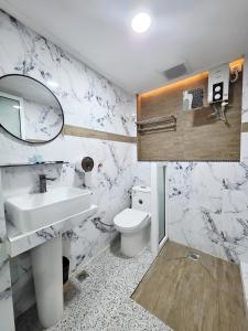 Ένα μπάνιο στο Grand Inn Hotel Semporna