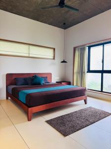 Giường trong phòng chung tại Hill Brown Resort +24 ảnh