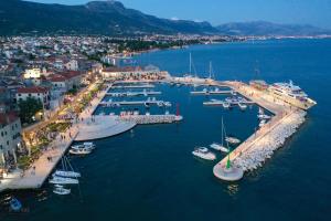 an aerial view of a harbor with boats in the water at Barać in Kaštela