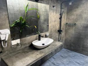 Koupelna v ubytování Oshi villa