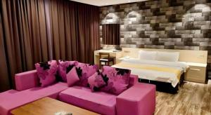 Ένα ή περισσότερα κρεβάτια σε δωμάτιο στο Kidurong Inn +130 φωτογραφίες