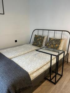 Postel nebo postele na pokoji v ubytování Near Ozas Studio