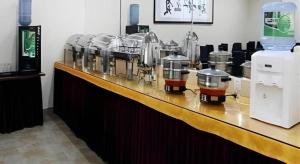 a counter with a bunch of machines on it at GreenTree Inn Rizhao Train Station in Rizhao