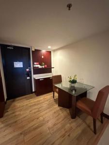 Kuchyň nebo kuchyňský kout v ubytování Am suites + 1 fotografie