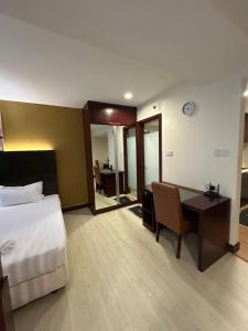 Postel nebo postele na pokoji v ubytování Am suites