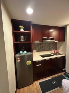 Kuchyň nebo kuchyňský kout v ubytování Am suites