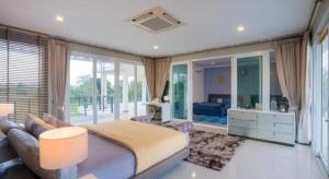 Posezení v ubytování Platinum Pool Villa