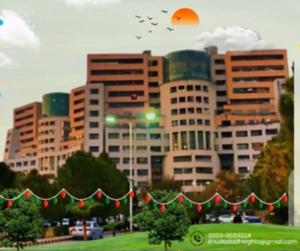 een stad met kerstverlichting voor de gebouwen bij Beautiful Apartment in Islamabad