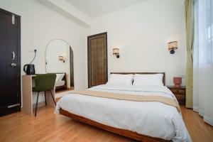 Postel nebo postele na pokoji v ubytování Ebel's Inn