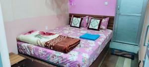 Postel nebo postele na pokoji v ubytování Hotel Garden of Dreams