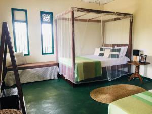 Ένα ή περισσότερα κρεβάτια σε δωμάτιο στο Rathkarawwa Heights