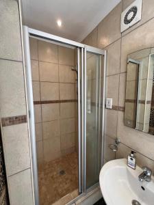 Koupelna v ubytování Amakhaya Lodge