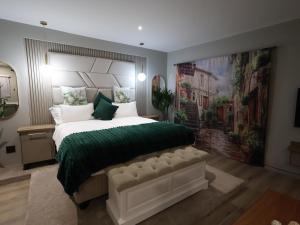 Ένα ή περισσότερα κρεβάτια σε δωμάτιο στο Calypso Sunset